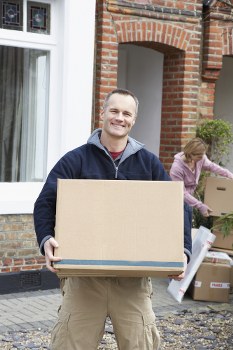 Careful loading of household furniture for transport in central London