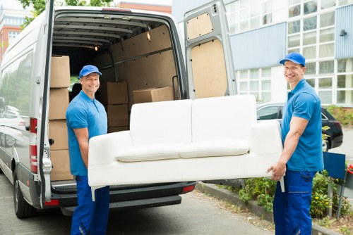 Removal team preparing a move in Westminster with boxes and furniture