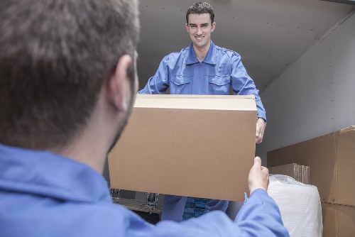 Professional removals team planning a move in Westminster streets