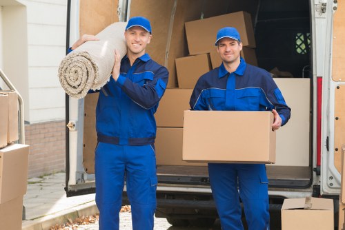 Local movers handling boxes and household items in Westminster