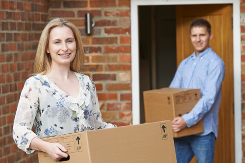 Office furniture and boxes prepared for a same day removal in Westminster