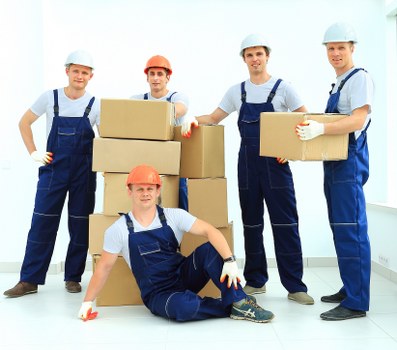 Moving team preparing a Westminster relocation with careful packing and planning