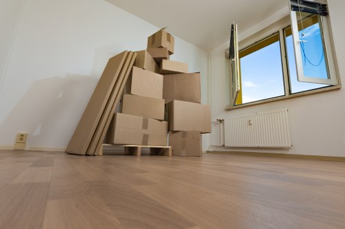 Removal team moving items safely in central Westminster