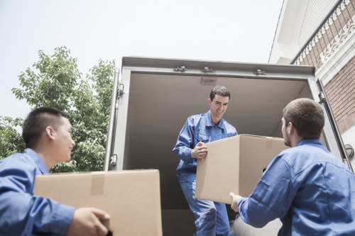 Professional removalists loading a van in Westminster