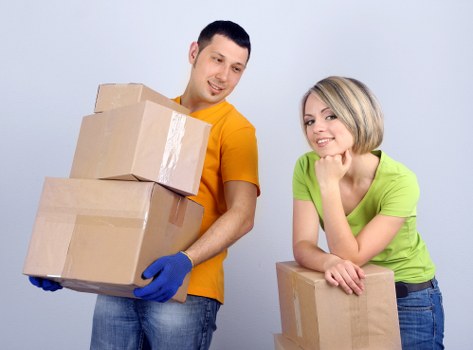 Professional removal team securing items safely for transport