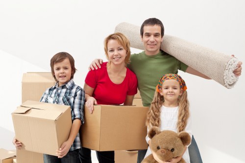 Careful wrapping and transport preparation for piano removals in central London