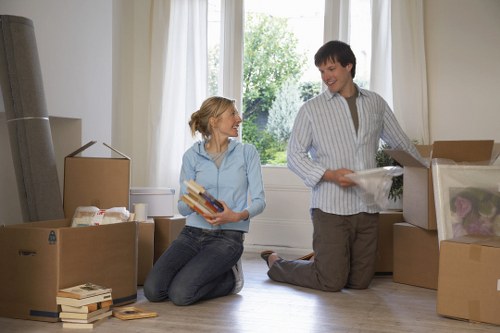 Loading furniture into a removal truck in central Westminster