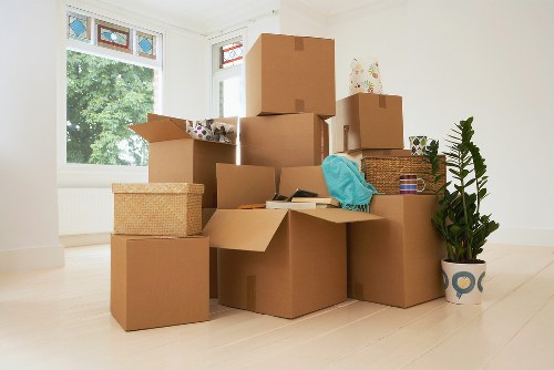 Organised moving boxes ready for a residential move in Westminster