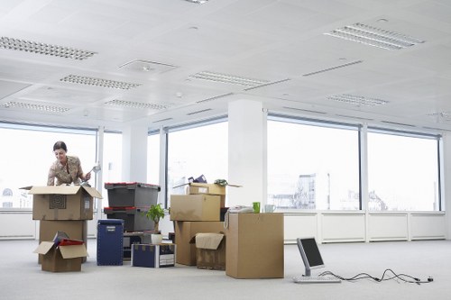 A moving team handling office packing for a Westminster business relocation