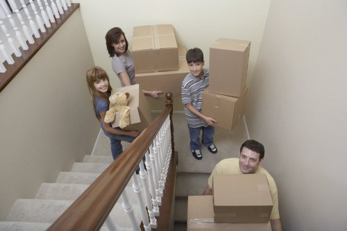 Packed boxes and furniture prepared for a residential move in Westminster